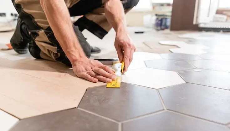 Professional tile installation in progress